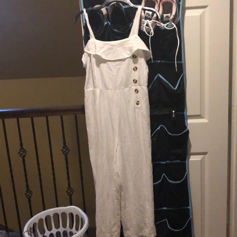 A white jump suit! The cutest on